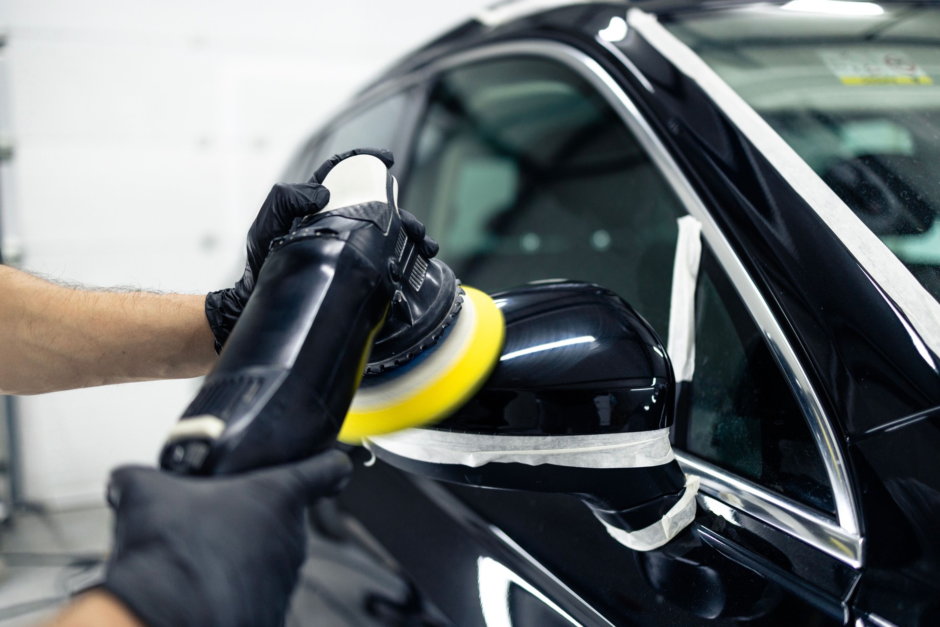 Close up view of car polishing process.